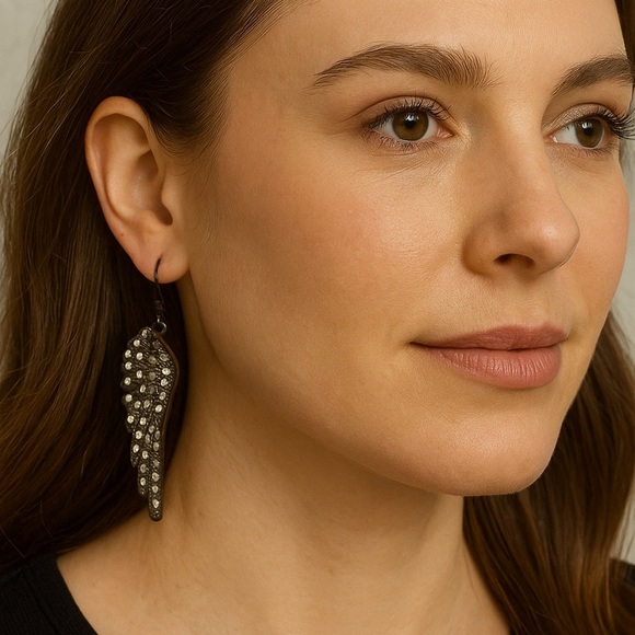 Elegant Silver Wing Earrings - Picture 1 of 3